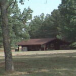 Photo of the trading post from across the parade ground